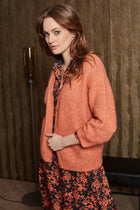 Soft orange cardigan with deep V-neck