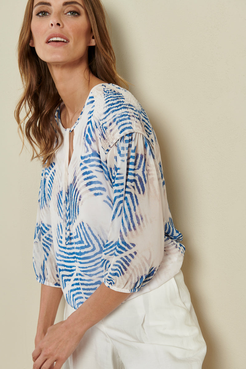 Tunic blouse with blue/white print