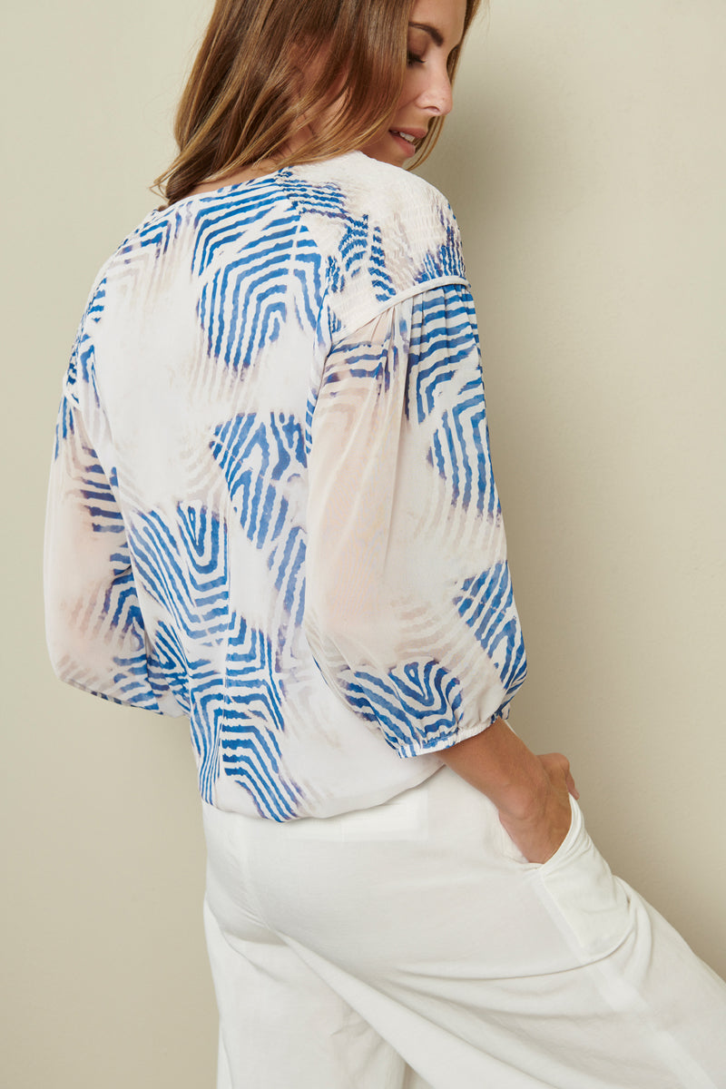 Tunic blouse with blue/white print