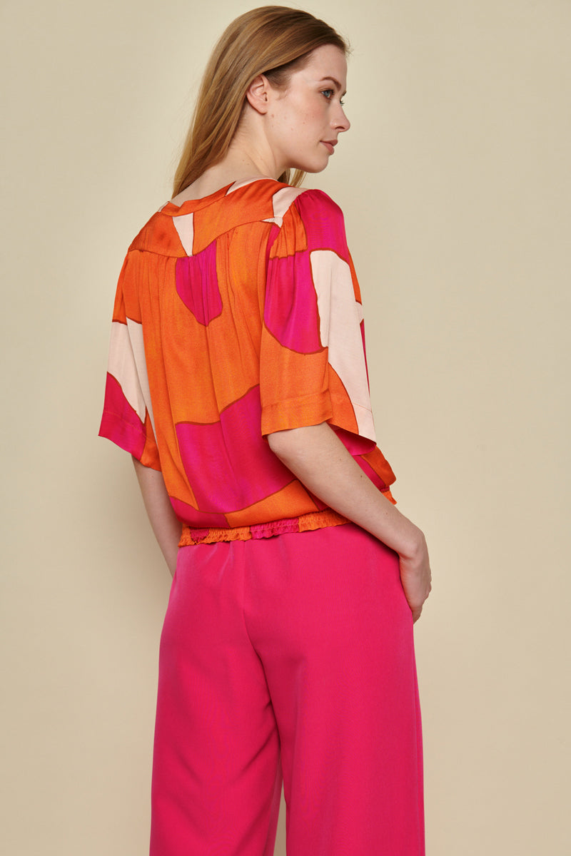 Tunic blouse with colorful graphic print