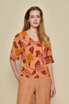 Boxy tunic blouse in orange/pink