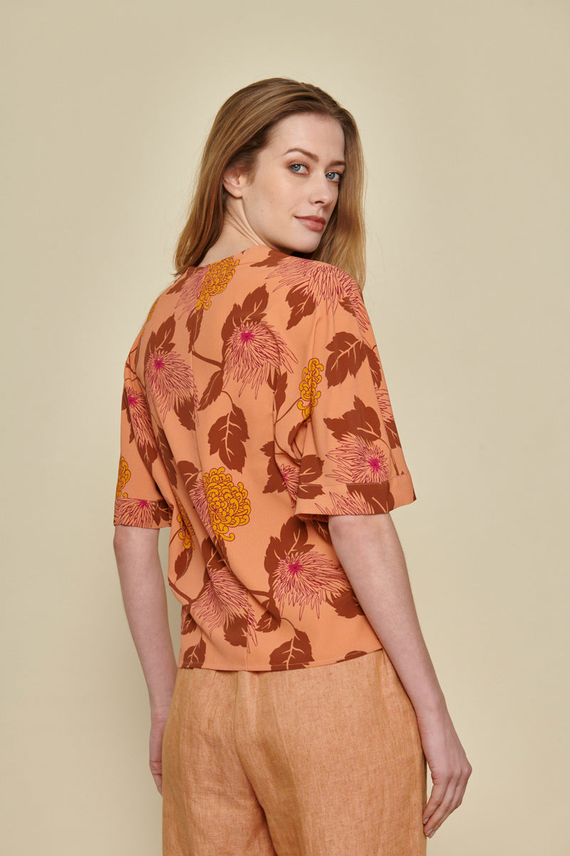 Boxy tunic blouse in orange/pink