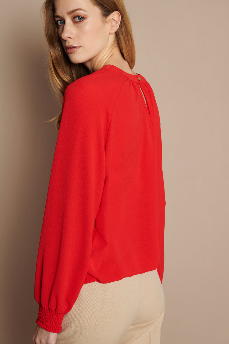 Red tunic blouse with pretty neckline