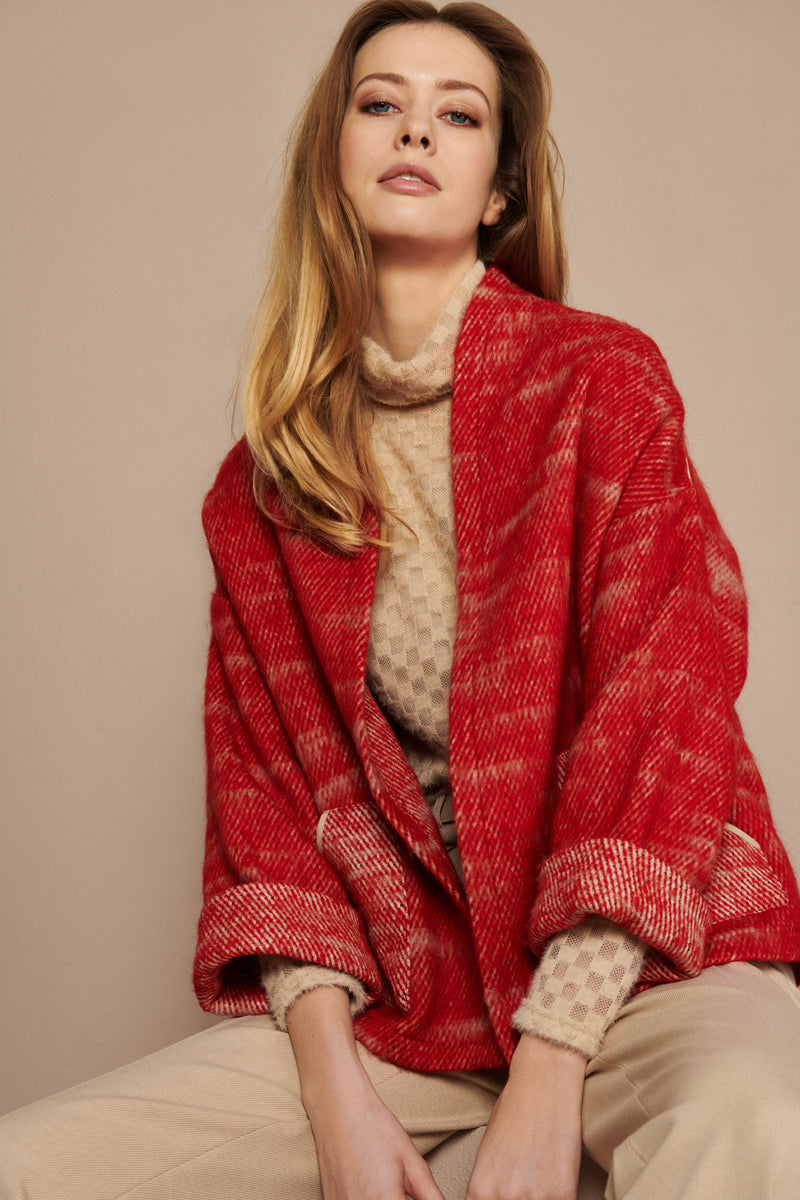 Red coat in knitted fabric