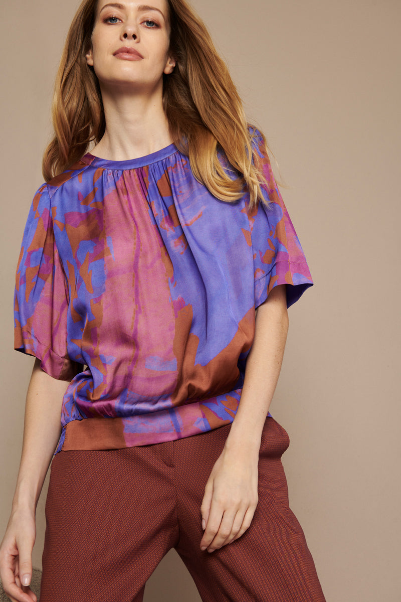 Purple tunic blouse with wide short sleeves