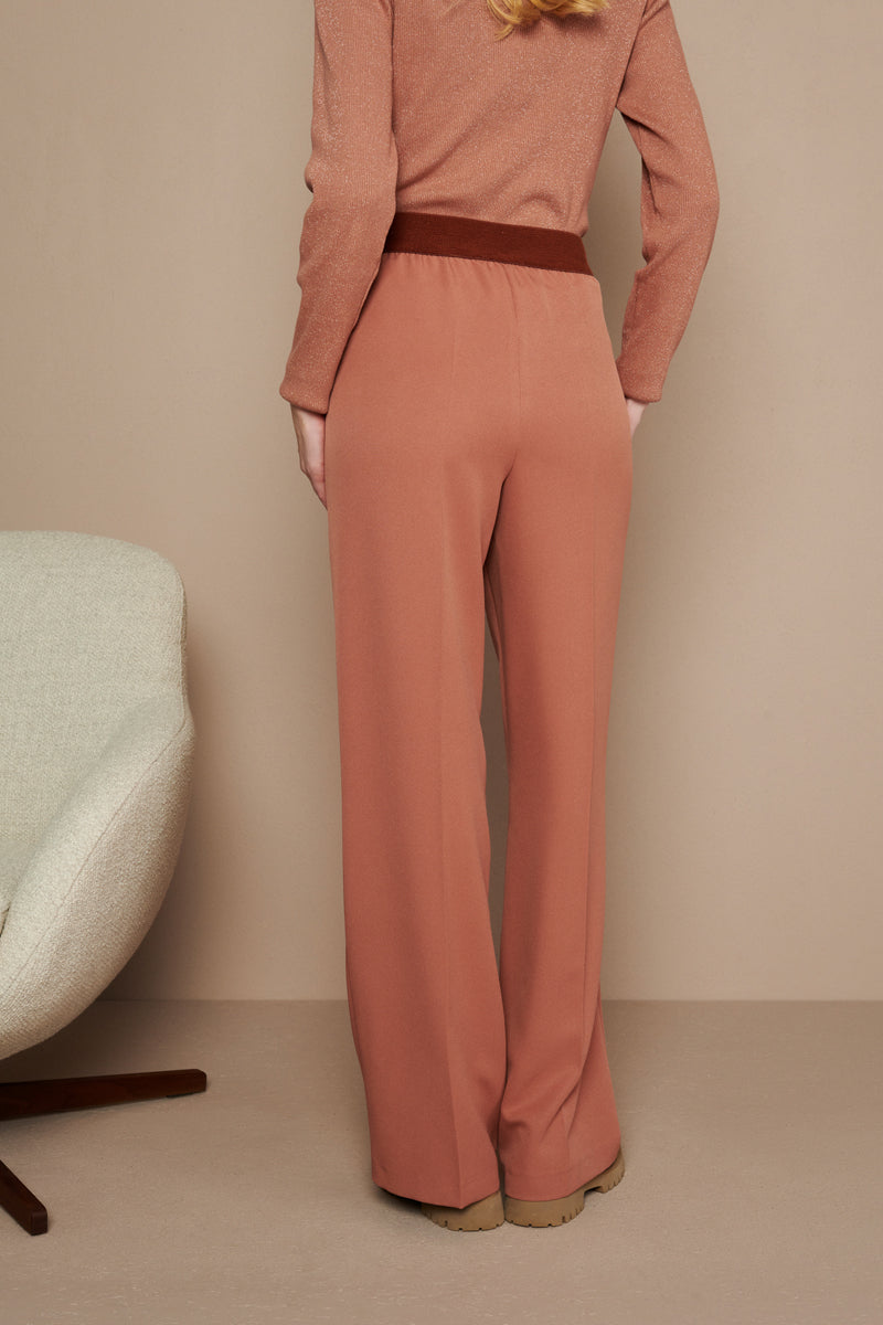 Wide-leg trousers in almond colour