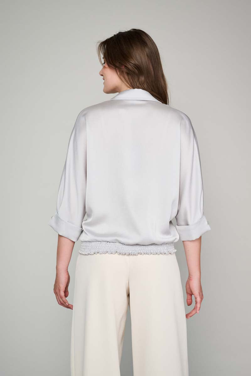Light grey tunic blouse with half-length sleeves