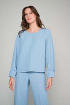 Light blue tunic blouse with round neckline