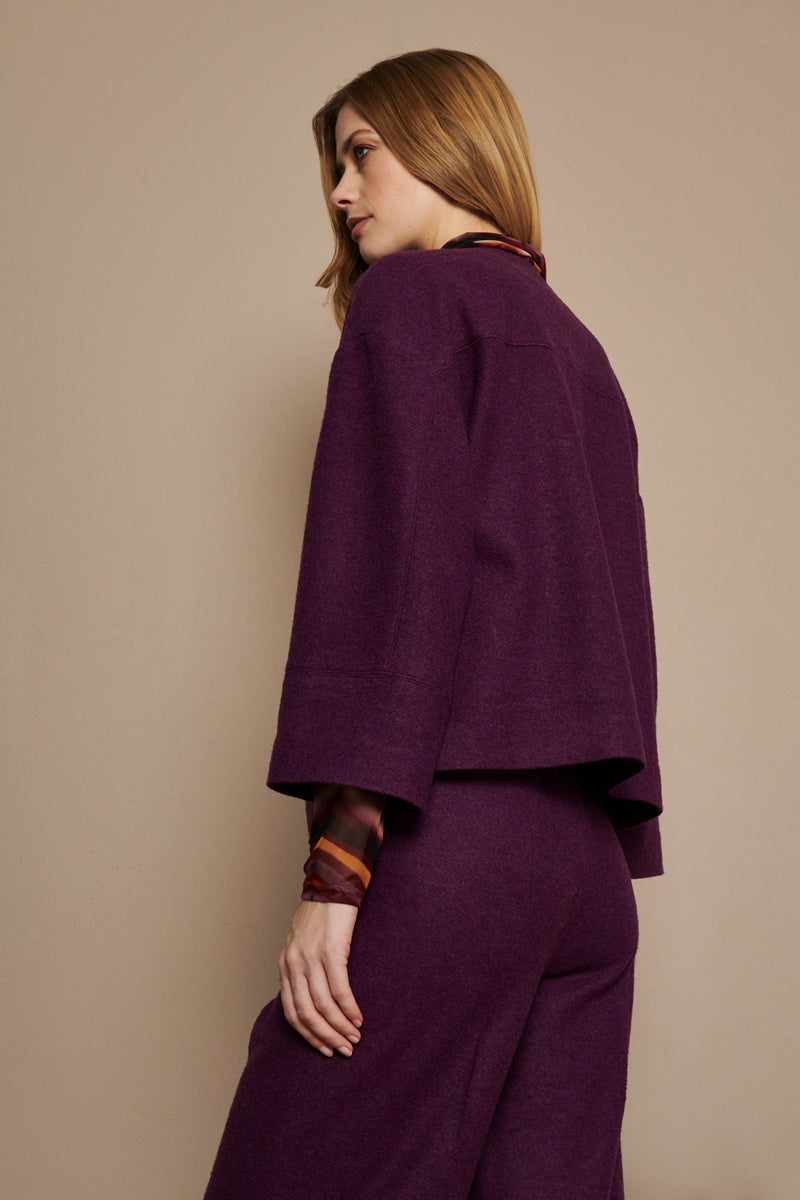 Dark purple coat with snap buttons
