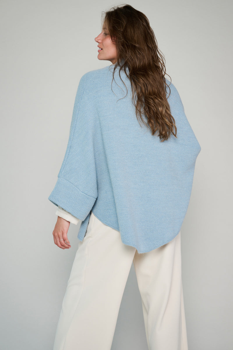 Light blue cape with buttons