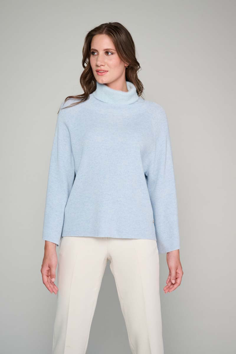 Light blue pullover with flared sleeves