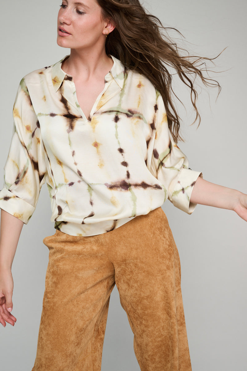 Ecru tunic blouse with print
