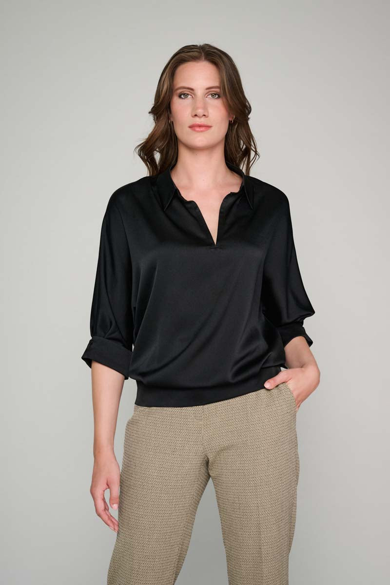 Black tunic blouse with half-length sleeves