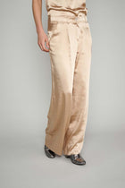 Flowing gold pants with side pockets