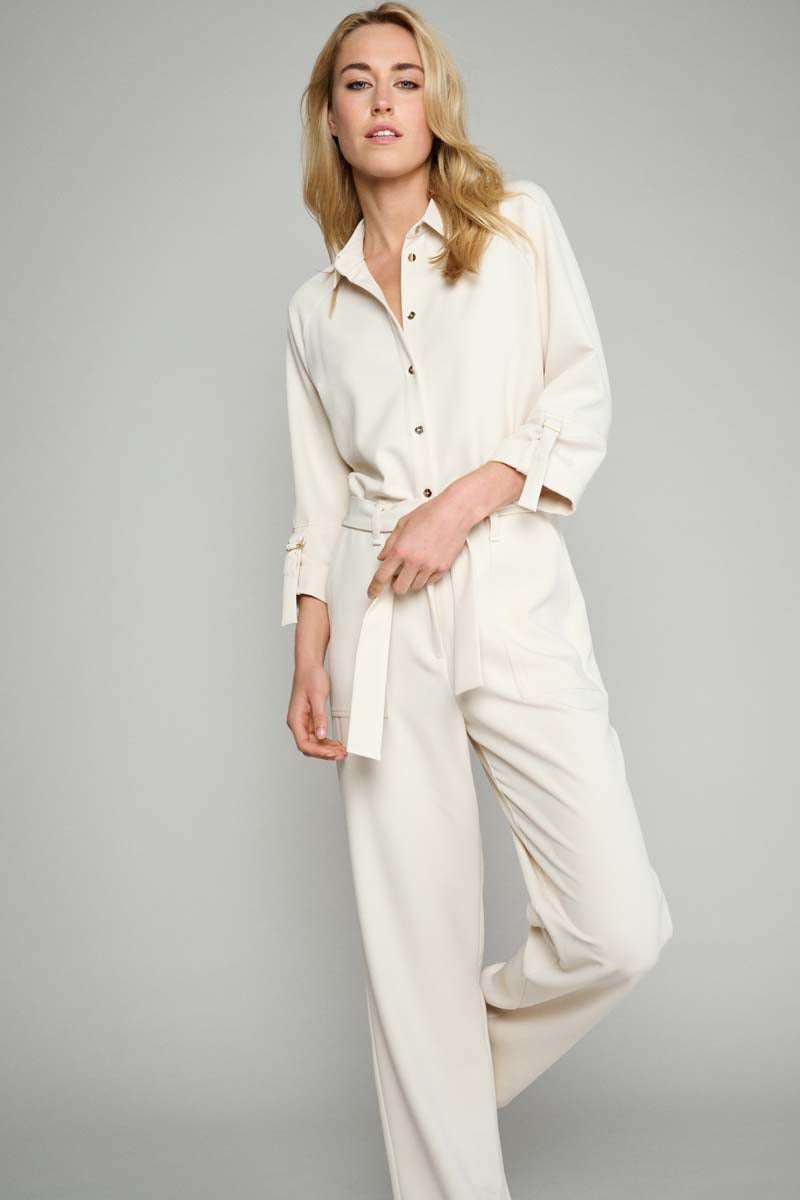 Ecru jumpsuit with gold button accents