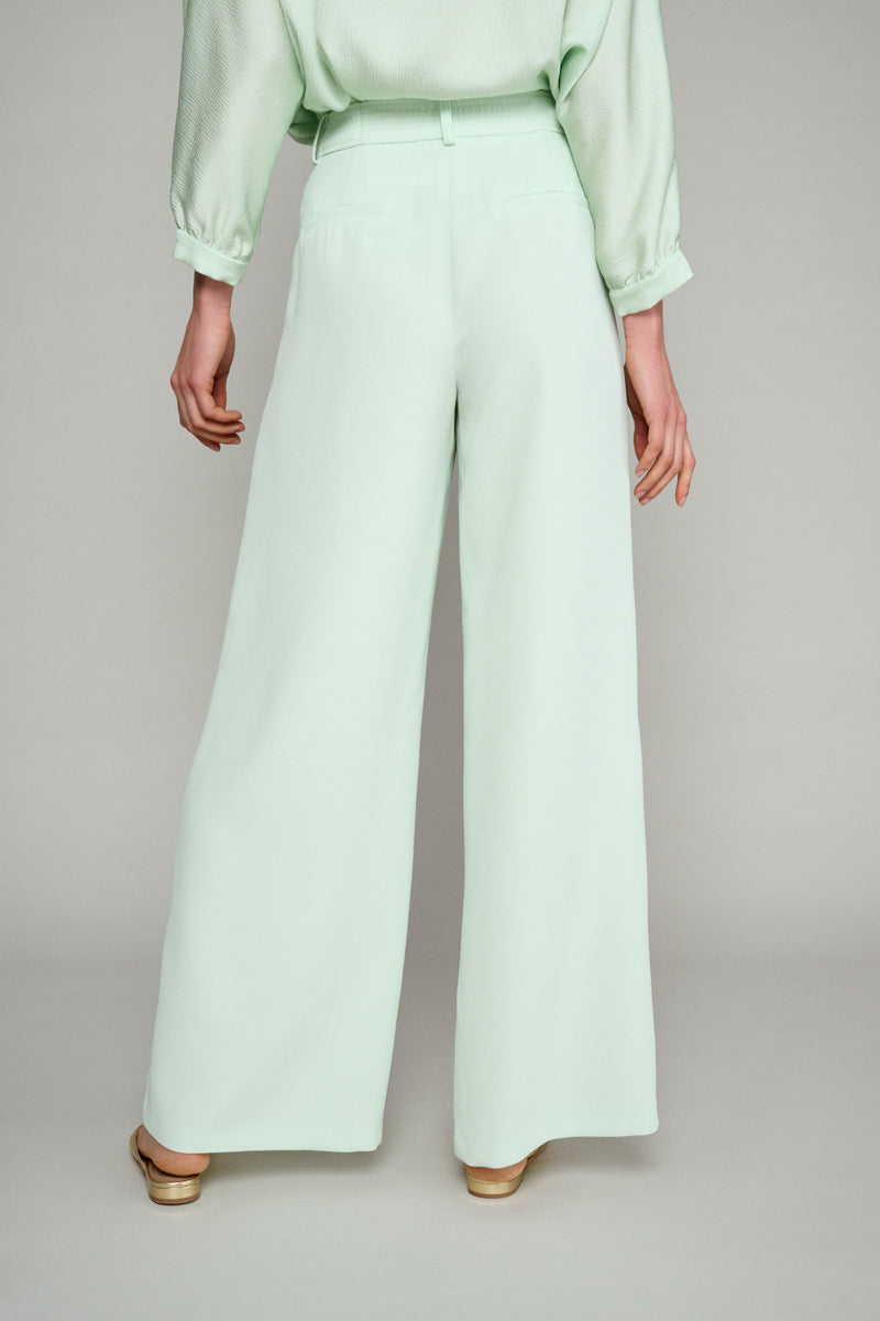 Loose trousers with wide leg in pastel green