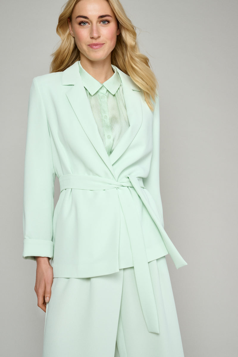 Trendy pastel green blazer