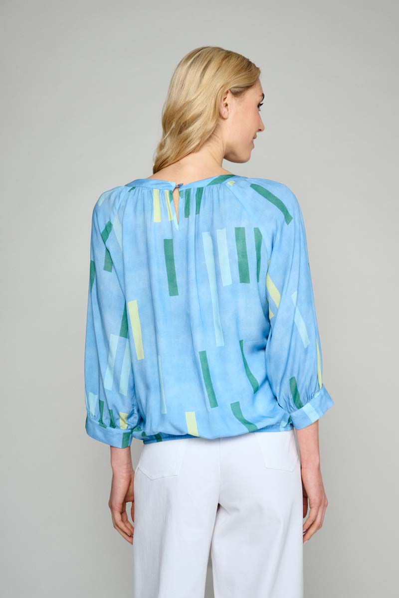 Loose-fitting blouse with blue print 