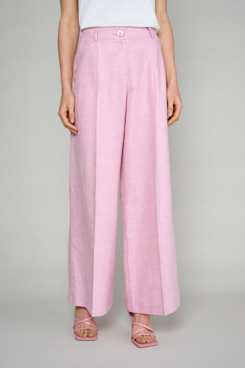 Loose pink trousers with wide legs