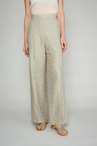 Wide trousers in green pique fabric
