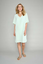 Loose-fitting tunic dress in pastel green