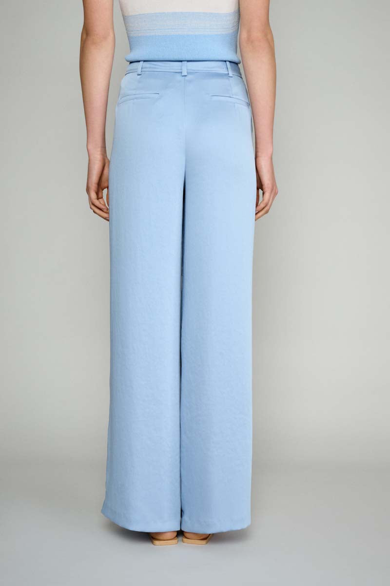 Loose blue trousers with wide legs