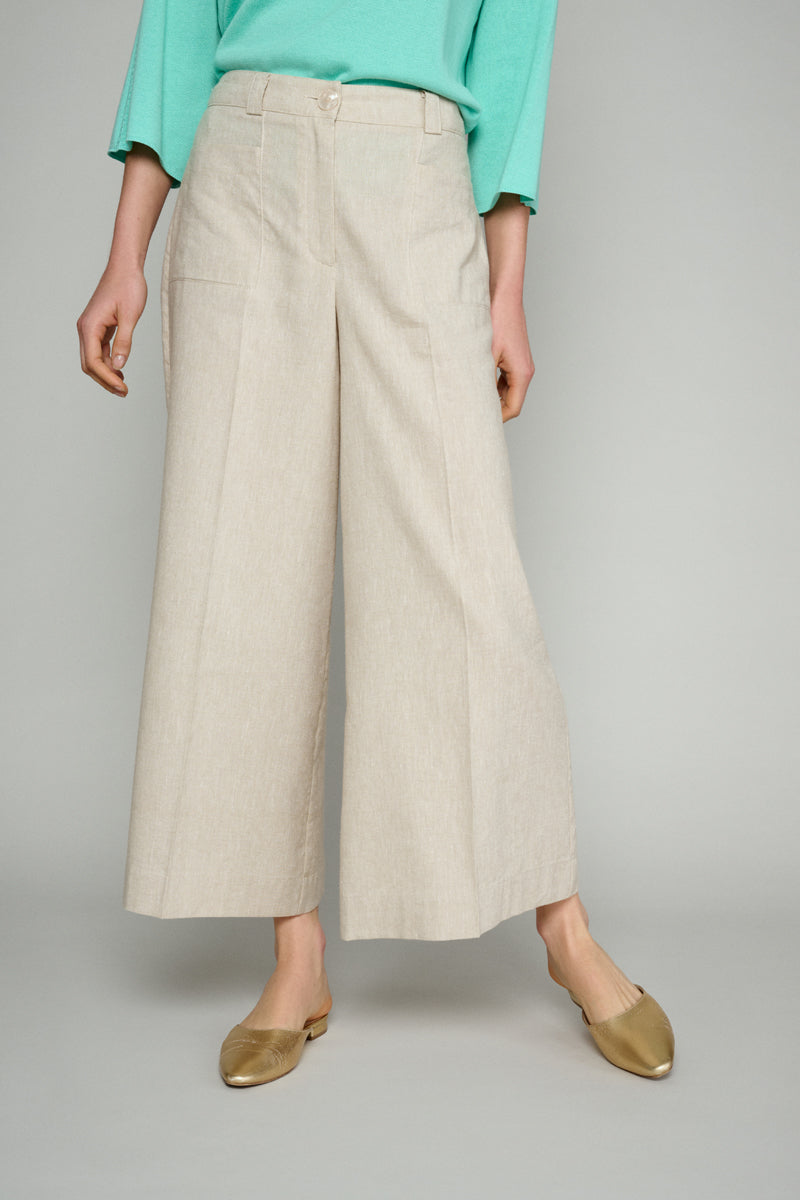 Beige trousers with wide legs