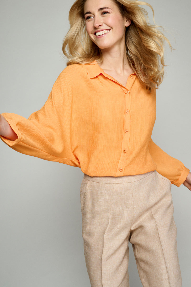 Supple orange blouse