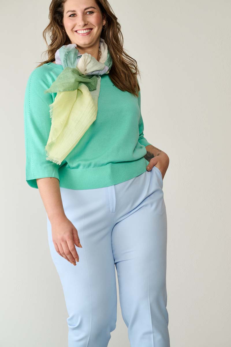 Smooth blue trousers with pleats