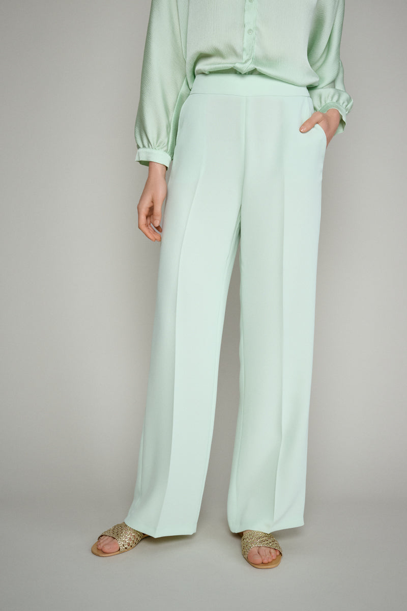 Wide trousers in pastel green