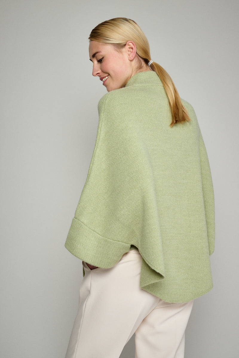 Light green cape with buttons