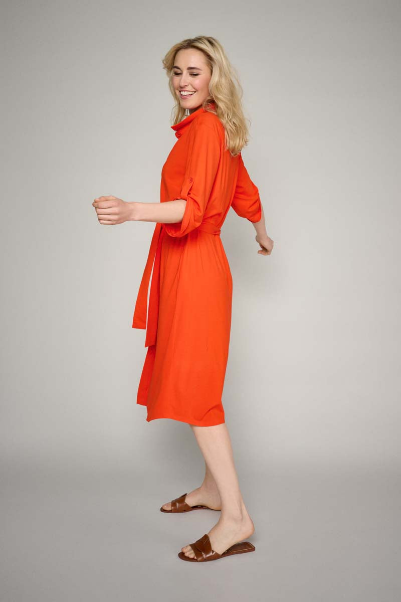 Fluid orange dress with stretch