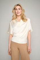 Cream top with waterfall neckline
