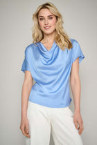 Blue top with waterfall neckline