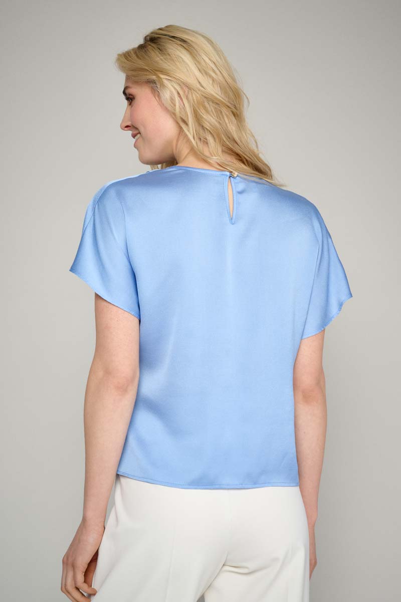 Blue top with waterfall neckline