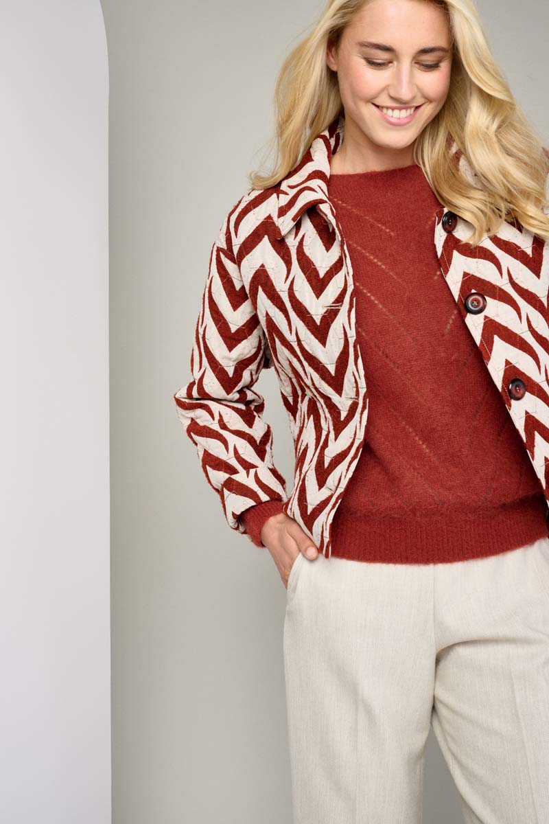 Red jacket in jacquard woven fabric