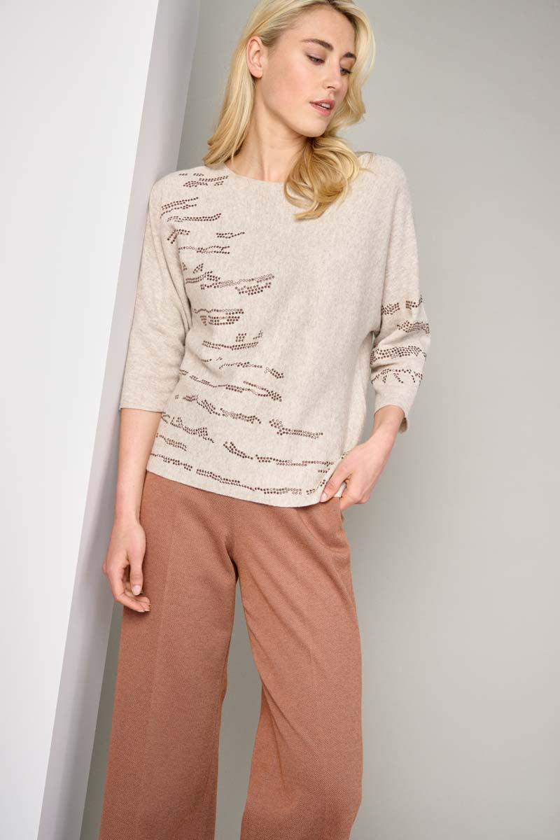 Trendy beige sweater with sequins