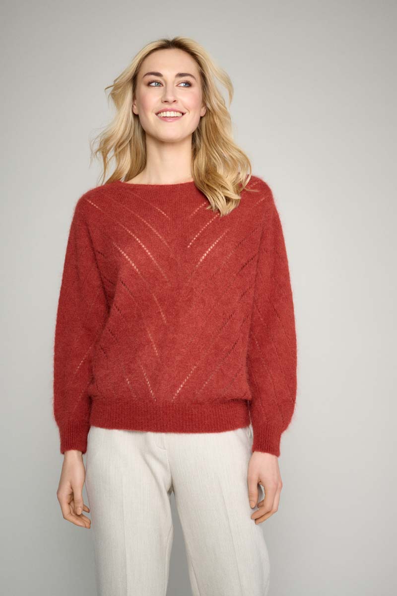 Copper-colored sweater with elegant detail