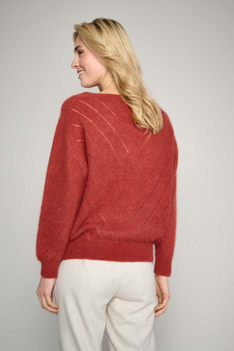 Copper-colored sweater with elegant detail