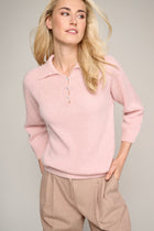 Trendy soft pink sweater with polo collar