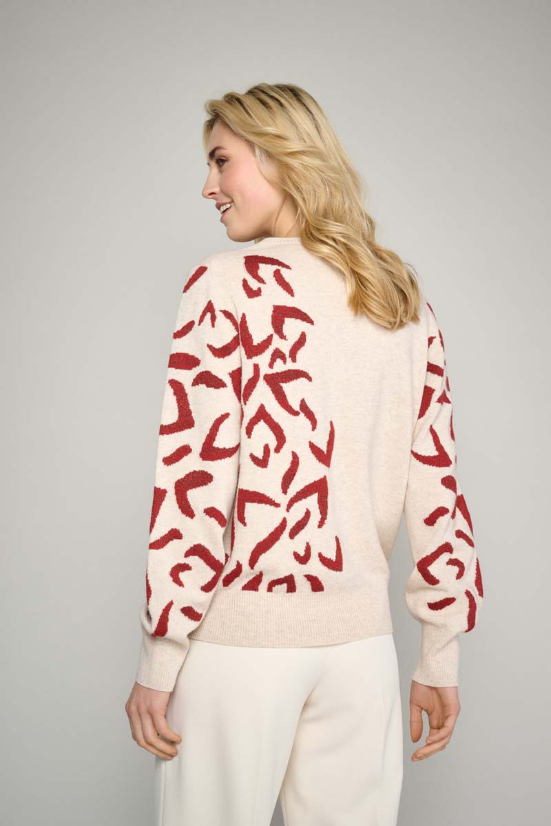 Pull beige avec impression moderne