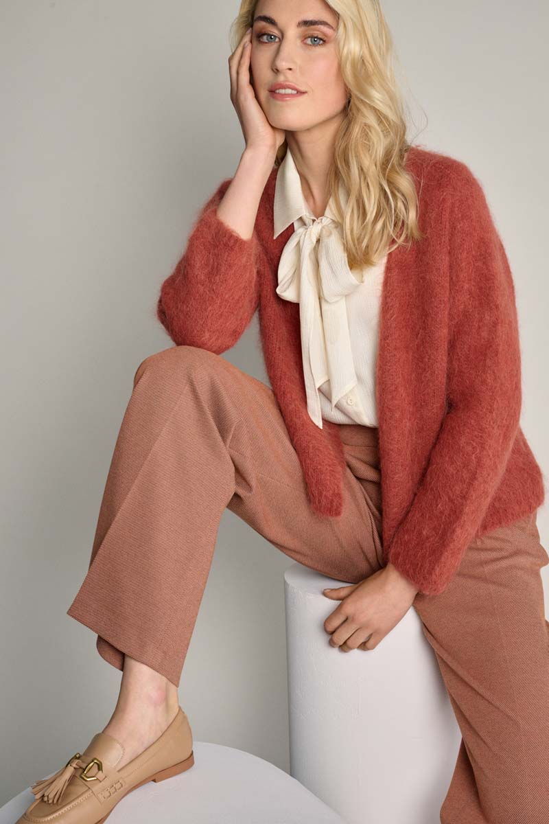 Copper-coloured loose cardigan with button closure