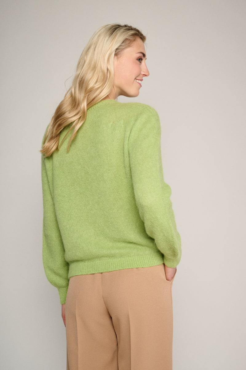 Green knitted jumper with round neck