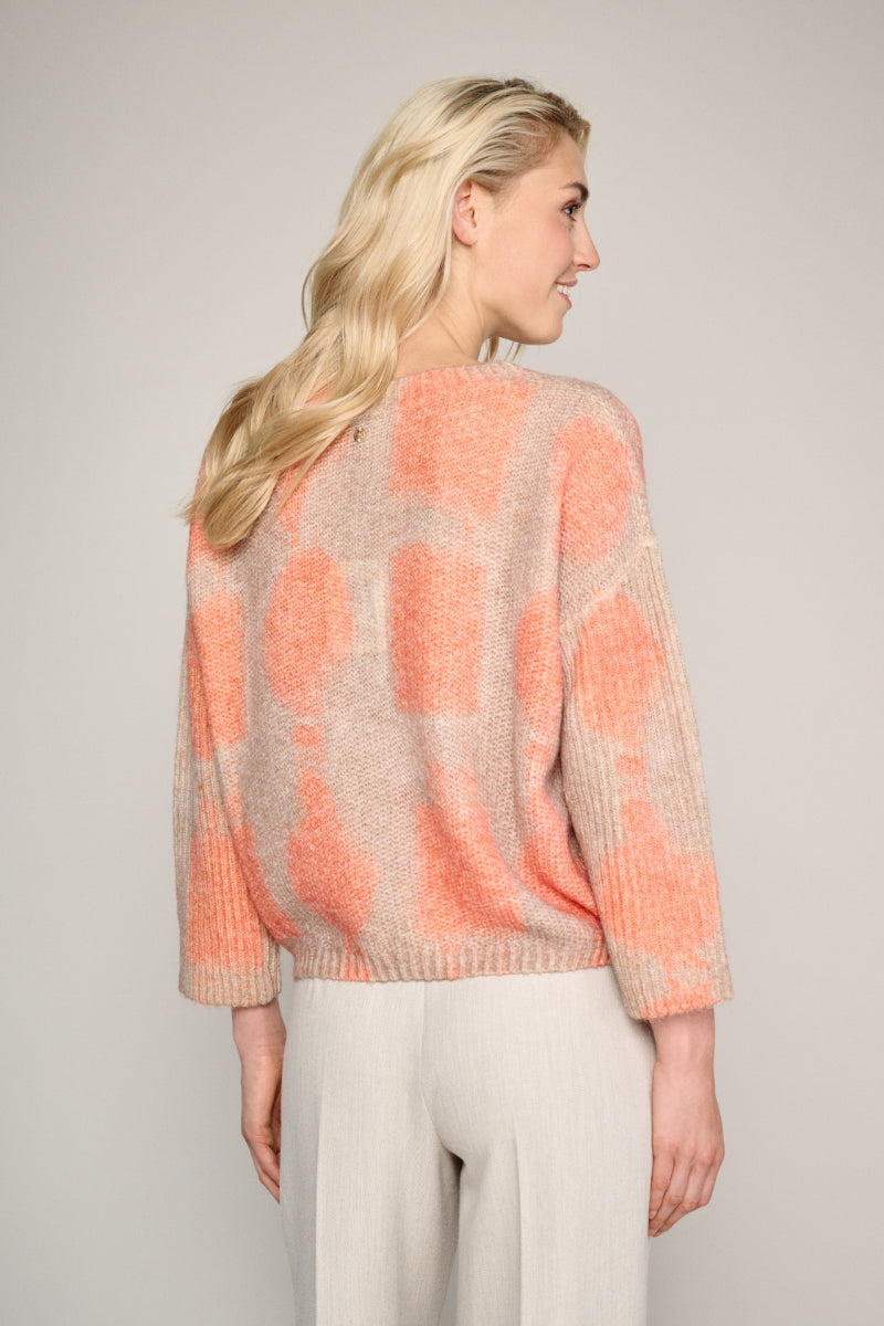 Knitted jumper in camel and orange