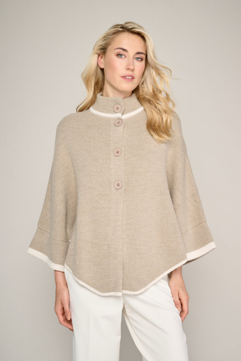 Trendy beige cape met crèmekleurig accent