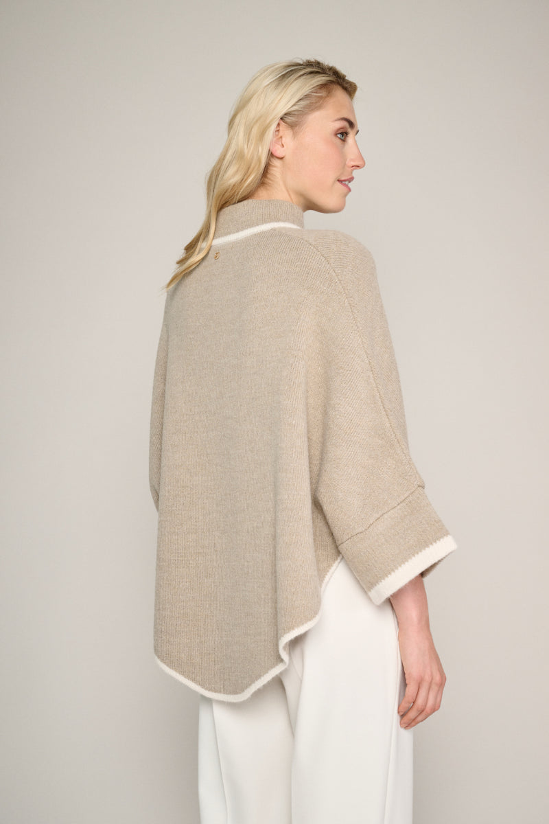 Trendy beige cape met crèmekleurig accent