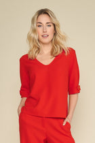 Red blouse with v-neck and beautifully finished sleeves