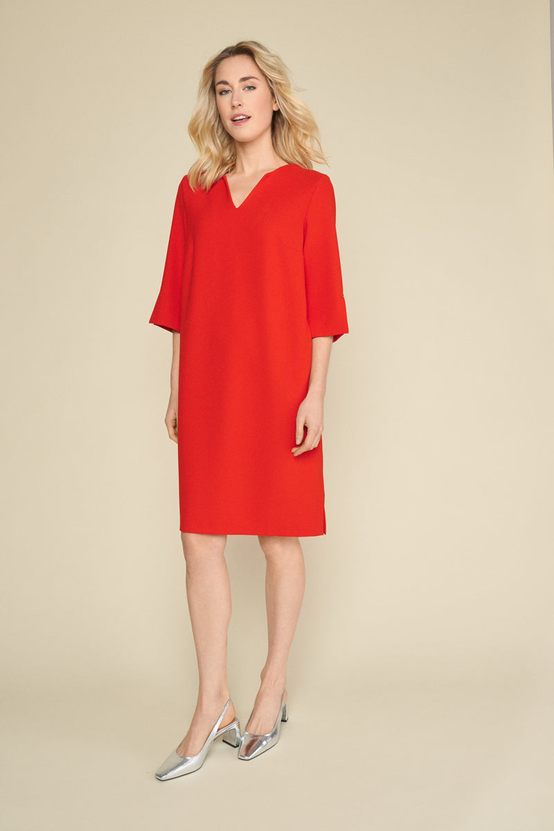 Elegant red dress with v-neck and beautifully finished sleeves