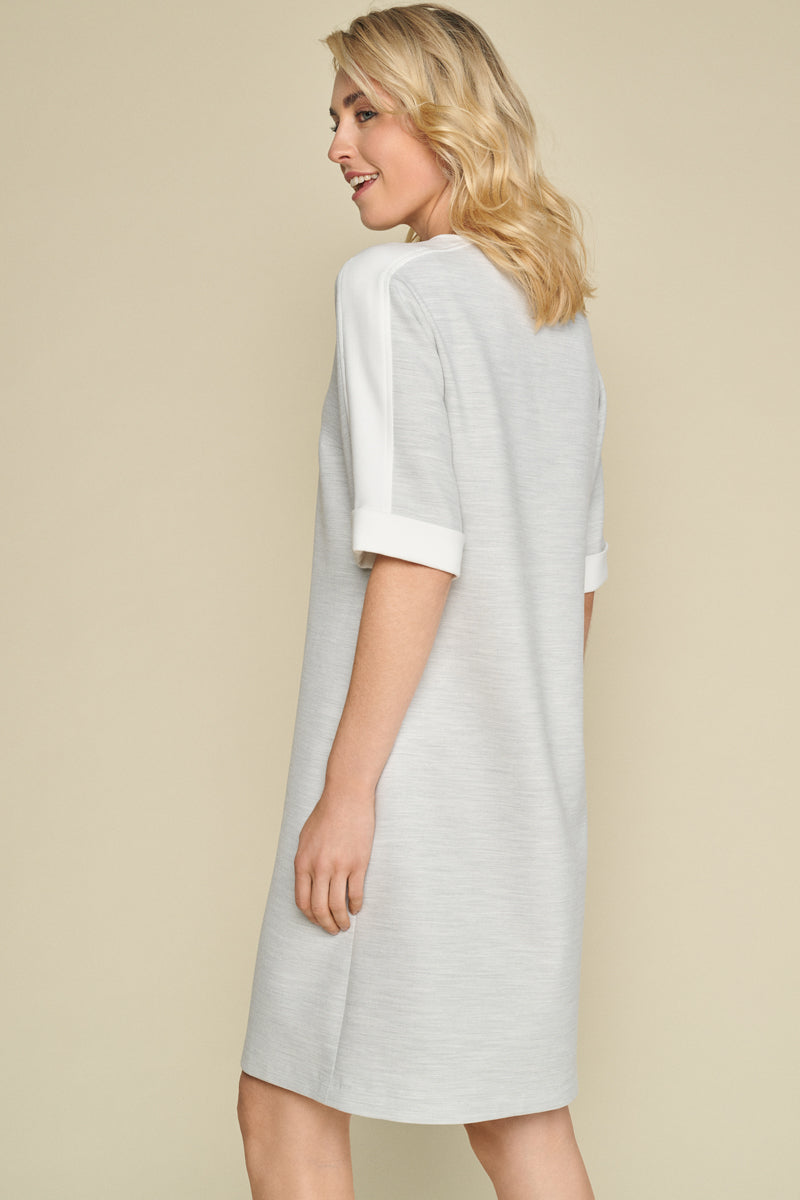 Grey dress with white trim on the sleeves