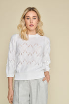 White pullover with crochet motif